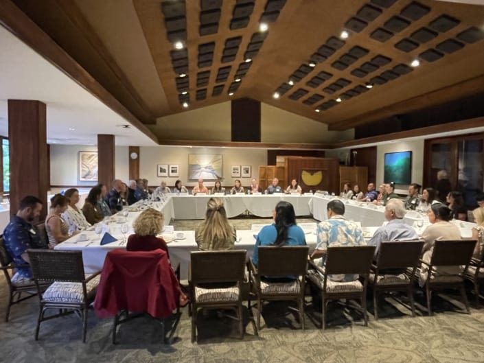Partnership breakfast around a large rectangular table